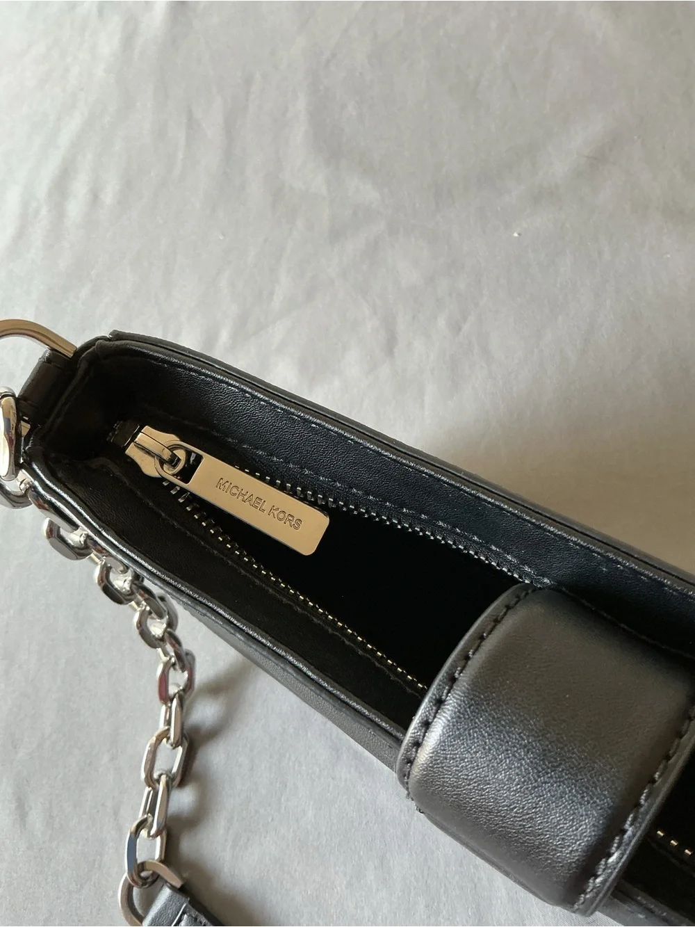 Michael Kors Black Shoulder Bag with Silver MK Emblem and Chain Strap